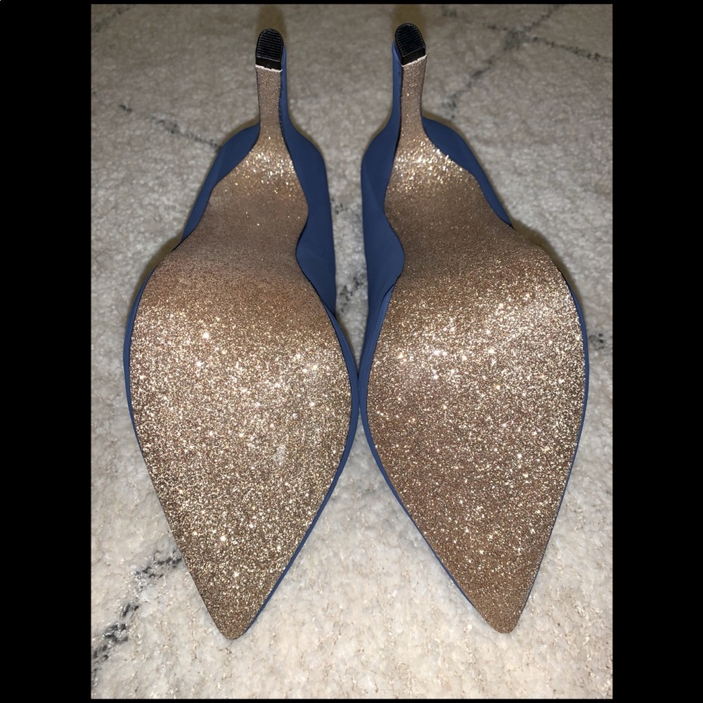 Royal blue heels with glitter sole.